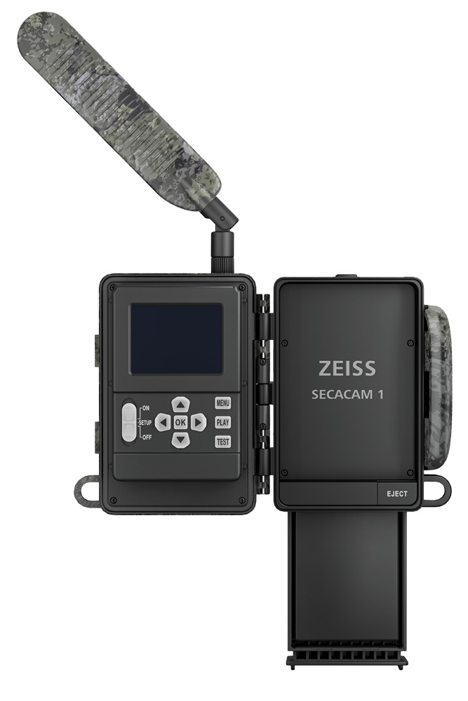 Zeiss Secacam 1, Gehäuse ist geöffnet und Display sowie Bedienelemente sind sichtbar, zudem ist der Akku zur Veranschaulichung aus dem Gerät herausstehend